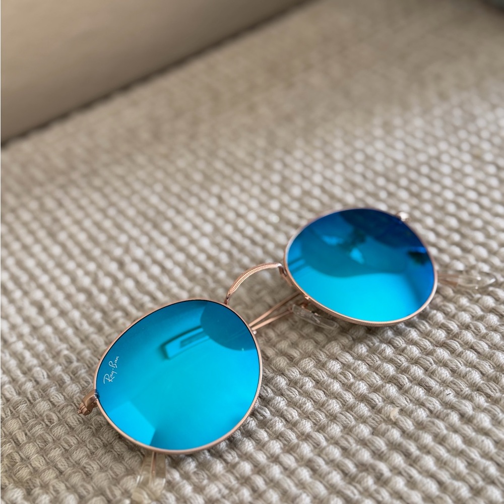 Ray-Ban Sunglasses with Vibrant Blue Lenses